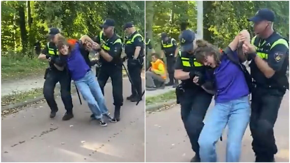 Agenten zijn niet onder de indruk van gillende klimaatactiviste en grijpen hard in! Agenten zijn niet onder de indruk van gillende klimaatactiviste en grijpen hard in!